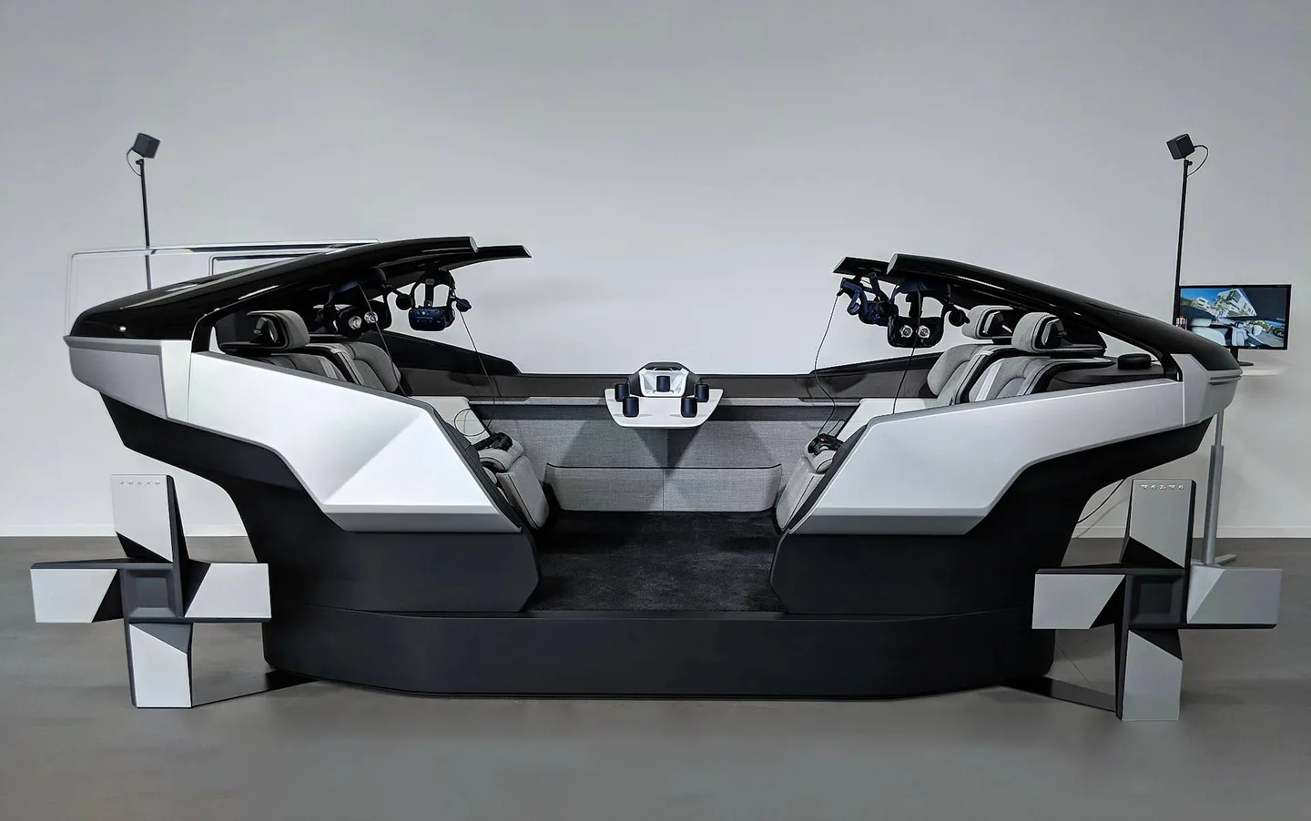 A full-scale Volvo 360C cabin installation fitted with virtual-reality headsets
